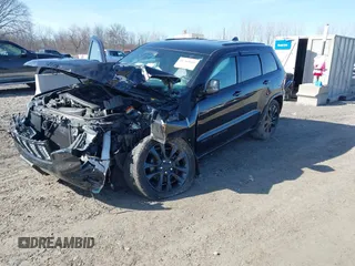 2019 Jeep Grand Cherokee Laredo E with VIN 1C4RJFAG6KC661777, listed as a IAAI auction lot 41762646 with 103,547 mi miles. Bid and sale history available at carsss.com. Image 2.