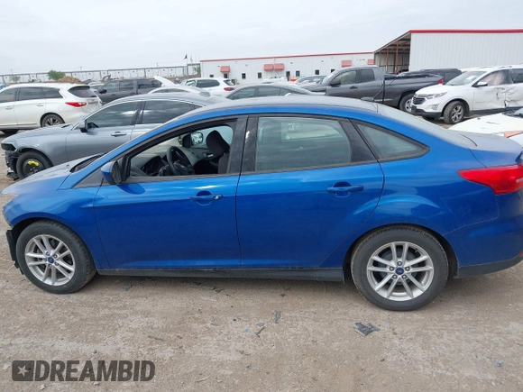 2018 Ford Focus SE with VIN 1FADP3F23JL210539, listed as a IAAI auction lot 41921226 with 100,609 mi miles. Bid and sale history available at carsss.com. Image 15.