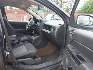 2014 Jeep Compass Sport with VIN 1C4NJCBA1ED725875, listed as a IAAI auction lot 42118863 with 133,136 mi miles. Bid and sale history available at carsss.com. Image 5.