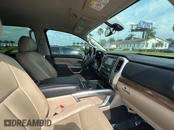 2016 Nissan Titan Platinum Reserve z VIN 1N6BA1F26GN512666, wystawiony jako Copart lot #54364115 z przebiegiem 120 182 mil mil oraz Czysty tytuł • Clean title. Historia ofert i sprzedaży dostępna na DreamBid. Obrazek 5.