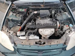 1999 Honda Civic DX with VIN 1HGEJ6223XL022105, listed as a Copart auction lot 82823084 with 288,187 mi miles and Salvage Title. Bid and sale history available at carsss.com. Image 11.