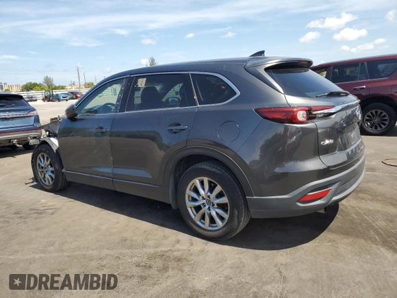 2016 Mazda CX-9 Touring with VIN JM3TCACY3G0115334, listed as a Copart auction lot 64129265 with 156,674 mi miles and Clean title. Bid and sale history available at DreamBid. Image 2.
