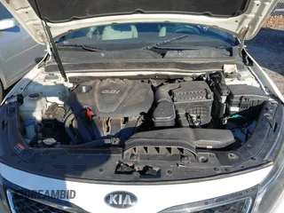 2015 Kia Optima LX z VIN KNAGM4A73F5601370, wystawiony jako IAAI lot #41633083 z przebiegiem 164 752 mil mil oraz . Historia ofert i sprzedaży dostępna na DreamBid. Obrazek 10.