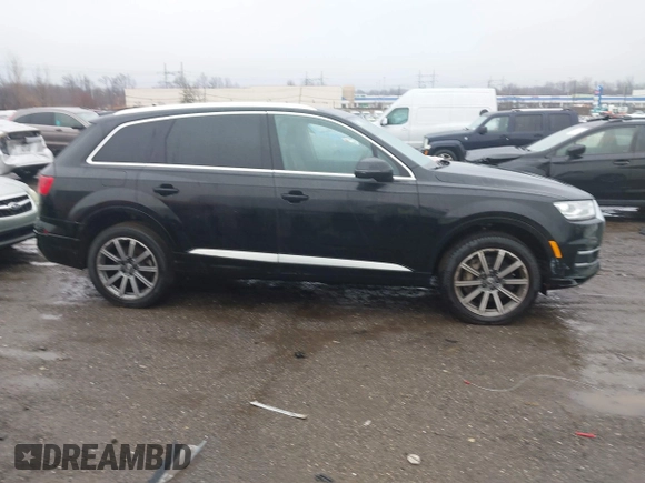 2019 Audi Q7 Premium with VIN WA1AHAF74KD029904, listed as a IAAI auction lot 41024012 with 79,896 mi miles and . Bid and sale history available at DreamBid. Image 13.