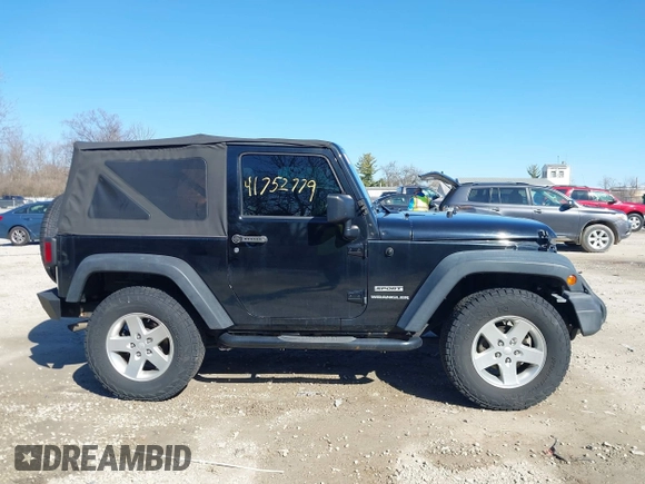 2014 Jeep Wrangler Sport with VIN 1C4AJWAGXEL319749, listed as a IAAI auction lot 41752779 with 140,045 mi miles and . Bid and sale history available at DreamBid. Image 13.