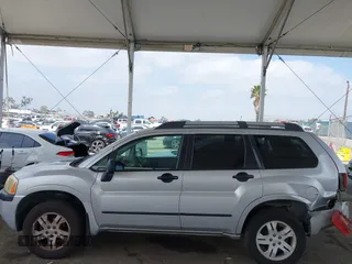 2005 Mitsubishi Endeavor LS z VIN 4A4MM21S25E049088, wystawiony jako IAAI lot #42228783 z przebiegiem 243 731 mil mil oraz . Historia ofert i sprzedaży dostępna na DreamBid. Obrazek 14.