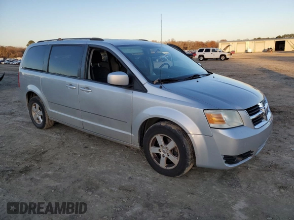 2010 Dodge Grand Caravan SXT with VIN 2D4RN5D16AR496795, listed as a Copart auction lot 83374834 with 99,902 mi miles and Salvage Title. Bid and sale history available at DreamBid. Image 4.