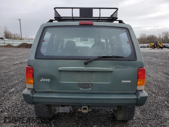 2000 Jeep Cherokee Classic with VIN 1J4FF58S3YL104384, listed as a Copart auction lot 46645415 with 253,730 mi miles and Salvage Title. Bid and sale history available at carsss.com. Image 6.