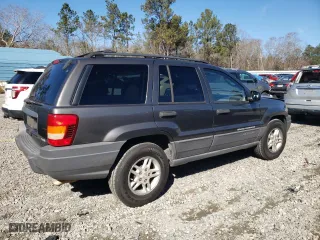 2004 Jeep Grand Cherokee Laredo with VIN 1J4GX48N14C435481, listed as a Copart auction lot 87855975 with 176,273 mi miles and Salvage Title. Bid and sale history available at carsss.com. Image 3.