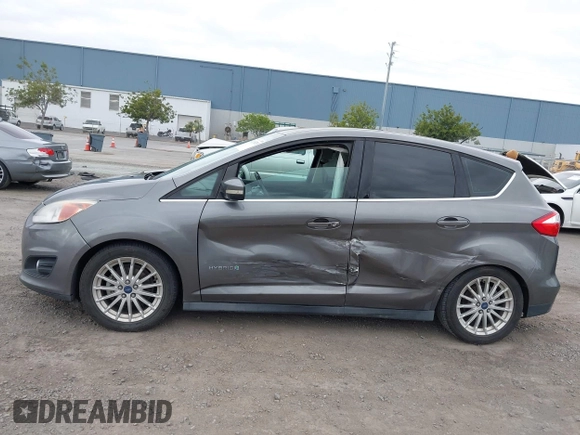 2013 Ford C-Max SEL z VIN 1FADP5BU2DL543029, wystawiony jako IAAI lot #42115325 z przebiegiem 131 855 mil mil oraz . Historia ofert i sprzedaży dostępna na DreamBid. Obrazek 14.