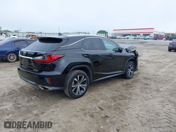 2016 Lexus RX 350 z VIN 2T2ZZMCA8GC005158, wystawiony jako IAAI lot #42105589 z przebiegiem 125 337 mil mil oraz . Historia ofert i sprzedaży dostępna na DreamBid. Obrazek 4.
