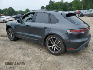 2024 Porsche Macan with VIN WP1AA2A54RLB14018, listed as a Copart auction lot 57595635 with 19,722 mi miles and Salvage title. Bid and sale history available at DreamBid. Image 2.