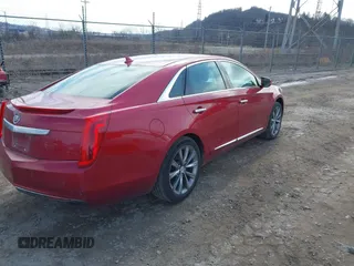 2013 Cadillac XTS z VIN 2G61N5S37D9177217, wystawiony jako IAAI lot #41747566 z przebiegiem 140 946 mil mil oraz . Historia ofert i sprzedaży dostępna na DreamBid. Obrazek 4.