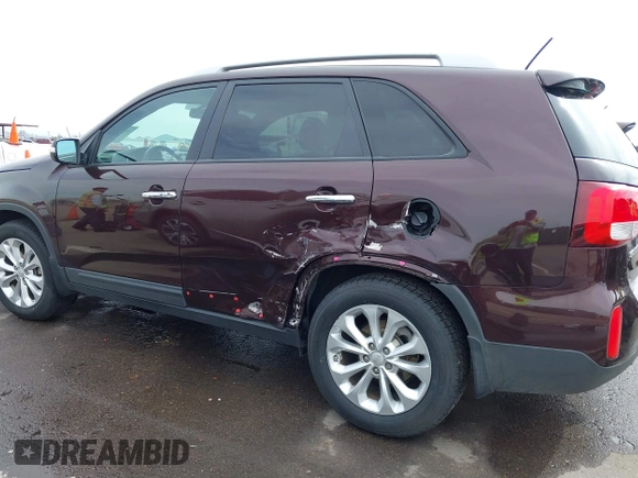 2015 Kia Sorento EX with VIN 5XYKU4A72FG628631, listed as a IAAI auction lot 41802719 with 69,888 mi miles. Bid and sale history available at carsss.com. Image 6.