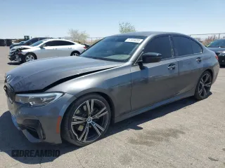 2021 BMW 3 Series 330i with VIN 3MW5R1J0XM8B95808, listed as a Copart auction lot 57659285 with 54,747 mi miles and Salvage title. Bid and sale history available at DreamBid. Image 1.