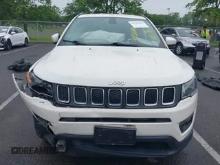 2021 Jeep Compass Latitude with VIN 3C4NJDBB6MT537568, listed as a IAAI auction lot 42528180 with 74,003 mi miles and . Bid and sale history available at DreamBid. Image 12.