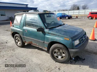 1996 Chevrolet Tracker z VIN 2CNBJ1863T6925397, wystawiony jako Copart lot #50446605 z przebiegiem 139 484 mil mil oraz Czysty tytuł • Clean title. Historia ofert i sprzedaży dostępna na DreamBid. Obrazek 4.