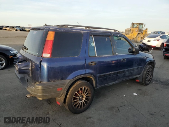 1999 Honda CR-V LX with VIN JHLRD1742XC066975, listed as a Copart auction lot 79447754 with 214,729 mi miles and Salvage Title. Bid and sale history available at carsss.com. Image 3.