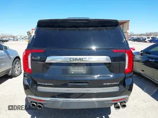2021 GMC Yukon Denali with VIN 1GKS2DKL3MR409536, listed as a IAAI auction lot 41728940 with 62,244 mi miles. Bid and sale history available at carsss.com. Image 16.