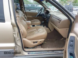 2000 Jeep Grand Cherokee Laredo with VIN 1J4GW48SXYC100248, listed as a IAAI auction lot 42182318 with 227,658 mi miles and . Bid and sale history available at DreamBid. Image 5.