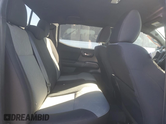 2023 Toyota Tacoma SR z VIN 3TMCZ5AN2PM536188, wystawiony jako Copart lot #58375675 z przebiegiem Nie podano mil oraz Szkoda całkowita • Salvage title. Historia ofert i sprzedaży dostępna na DreamBid. Obrazek 10.