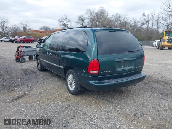 1999 Chrysler Town & Country with VIN 1C4GP54G6XB603564, listed as a IAAI auction lot 41823340 with 104,321 mi miles and . Bid and sale history available at DreamBid. Image 3.