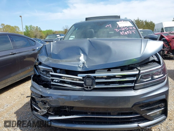 2018 Volkswagen Tiguan SEL Premium with VIN 3VV5B7AX4JM201579, listed as a IAAI auction lot 41932201 with 118,728 mi miles and . Bid and sale history available at DreamBid. Image 12.