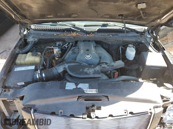 2002 Cadillac Escalade z VIN 1GYEK63N82R329743, wystawiony jako Copart lot #56587295 z przebiegiem 215 694 mil mil oraz Szkoda całkowita • Salvage title. Historia ofert i sprzedaży dostępna na DreamBid. Obrazek 11.