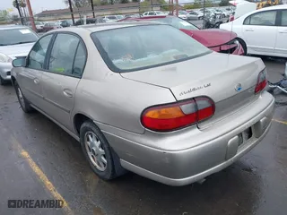 1998 Chevrolet Malibu LS with VIN 1G1NE52M1W6249023, listed as a IAAI auction lot 41779319 with 71,307 mi miles. Bid and sale history available at carsss.com. Image 3.