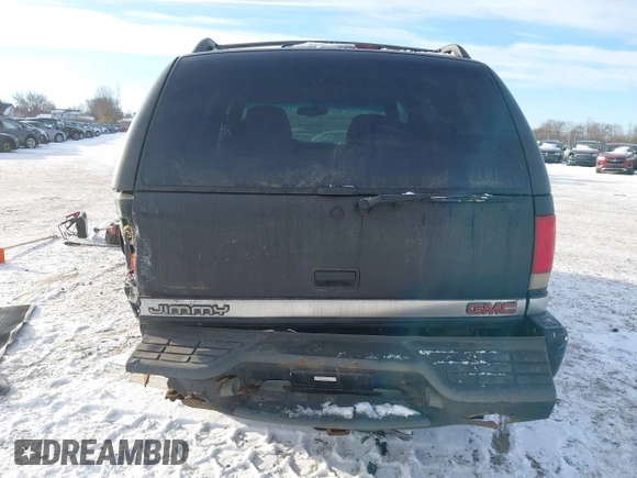 1999 GMC Jimmy SLE with VIN 1GKDT13W5X2520020, listed as a IAAI auction lot 41337936 with 277,615 mi miles. Bid and sale history available at carsss.com. Image 16.