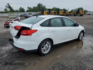 2016 Ford Focus SE z VIN 1FADP3F22GL260860, wystawiony jako Copart lot #61085065 z przebiegiem 136 160 mil mil oraz Szkoda całkowita • Salvage title. Historia ofert i sprzedaży dostępna na DreamBid. Obrazek 3.