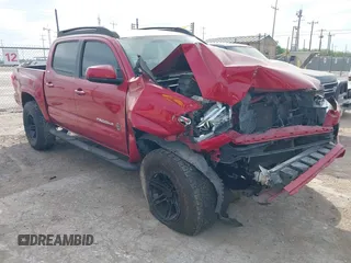 2016 Toyota Tacoma SR z VIN 5TFCZ5AN4GX003317, wystawiony jako IAAI lot #42256631 z przebiegiem 153 990 mil mil oraz . Historia ofert i sprzedaży dostępna na DreamBid. Obrazek 1.