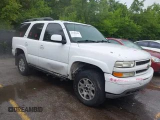 2005 Chevrolet Tahoe Z71 z VIN 1GNEK13T85R171939, wystawiony jako IAAI lot #42420441 z przebiegiem 233 210 mil mil oraz . Historia ofert i sprzedaży dostępna na DreamBid. Obrazek 1.
