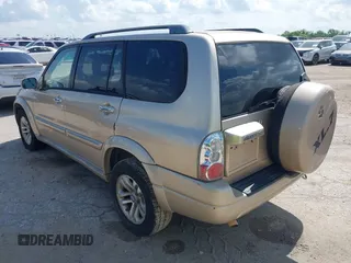 2006 Suzuki XL7 with VIN JS3TX92V064101841, listed as a IAAI auction lot 42672750 with 203,052 mi miles and . Bid and sale history available at DreamBid. Image 3.