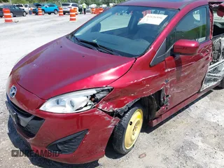 2012 Mazda 5 Grand Touring with VIN JM1CW2DL1C0123418, listed as a IAAI auction lot 42126956 with 112,411 mi miles and . Bid and sale history available at DreamBid. Image 6.