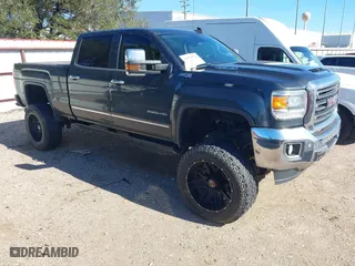 2018 GMC Sierra 2500HD SLT with VIN 1GT12TEY8JF139452, listed as a IAAI auction lot 41253932 with 202,672 mi miles. Bid and sale history available at carsss.com. Image 1.