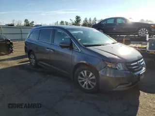 2017 Honda Odyssey SE with VIN 5FNRL5H37HB018616, listed as a Copart auction lot 87174674 with 124,367 mi miles and Salvage Title. Bid and sale history available at carsss.com. Image 4.