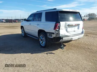 2020 GMC Yukon Denali with VIN 1GKS2CKJ3LR260455, listed as a IAAI auction lot 41690495 with 92,498 mi miles. Bid and sale history available at carsss.com. Image 3.