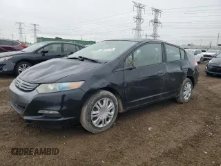 2010 Honda Insight LX with VIN JHMZE2H56AS022299, listed as a Copart auction lot 54872215 with 149,514 mi miles and Salvage title. Bid and sale history available at DreamBid. Image 1.