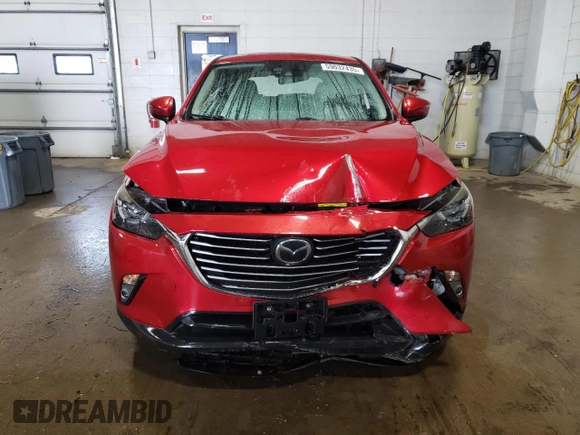 2017 Mazda CX-3 Grand Touring z VIN JM1DKFD70H0148182, wystawiony jako Copart lot #59032435 z przebiegiem 70 166 mil mil oraz Szkoda całkowita • Salvage title. Historia ofert i sprzedaży dostępna na DreamBid. Obrazek 5.