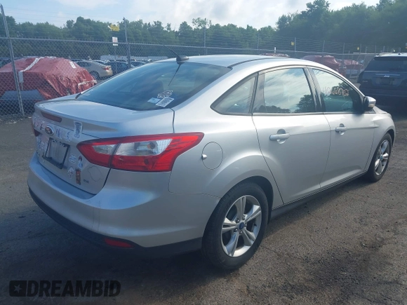 2013 Ford Focus SE with VIN 1FADP3F26DL249436, listed as a IAAI auction lot 42668702 with 79,182 mi miles and . Bid and sale history available at DreamBid. Image 4.