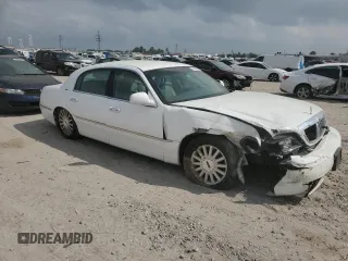 2003 Lincoln Town Car Executive z VIN 1LNHM81W73Y652530, wystawiony jako Copart lot #51606225 z przebiegiem 122 019 mil mil oraz Szkoda całkowita • Salvage title. Historia ofert i sprzedaży dostępna na DreamBid. Obrazek 4.