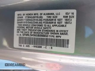 2016 Honda Odyssey Touring Elite with VIN 5FNRL5H96GB090653, listed as a IAAI auction lot 41720195 with 68,969 mi miles. Bid and sale history available at carsss.com. Image 9.
