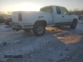 1995 GMC Sierra 1500 z VIN 2GTEK19KXS1504198, wystawiony jako Copart lot #87508215 z przebiegiem 3 210 847 mil mil oraz Szkody całkowita. Historia ofert i sprzedaży dostępna na DreamBid. Obrazek 3.