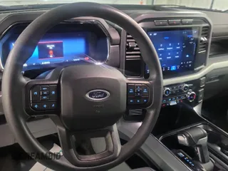 2023 Ford F-150 Lightning Pro z VIN 1FTVW1EL0PWG02840, wystawiony jako IAAI lot #42379448 z przebiegiem 52 710 mil mil oraz . Historia ofert i sprzedaży dostępna na DreamBid. Obrazek 23.