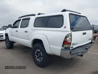 2009 Toyota Tacoma PreRunner with VIN 3TMJU62N49M076433, listed as a IAAI auction lot 41902369 with 164,827 mi miles. Bid and sale history available at carsss.com. Image 3.