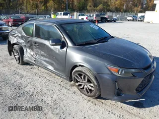 2016 Scion tC z VIN JTKJF5C70GJ020058, wystawiony jako IAAI lot #40647769 z przebiegiem 174 228 mil mil oraz . Historia ofert i sprzedaży dostępna na DreamBid. Obrazek 1.