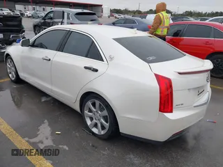 2013 Cadillac ATS Luxury z VIN 1G6AB5RA1D0156368, wystawiony jako IAAI lot #41283194 z przebiegiem 95 770 mil mil oraz . Historia ofert i sprzedaży dostępna na DreamBid. Obrazek 3.