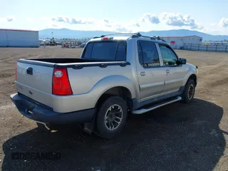 2003 Ford Explorer Sport Trac XLS z VIN 1FMZU77E63UA25807, wystawiony jako IAAI lot #42104625 z przebiegiem 230 608 mil mil oraz . Historia ofert i sprzedaży dostępna na DreamBid. Obrazek 4.
