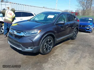 2019 Honda CR-V Touring with VIN 2HKRW1H96KH505447, listed as a IAAI auction lot 41876110 with 56,104 mi miles. Bid and sale history available at carsss.com. Image 17.
